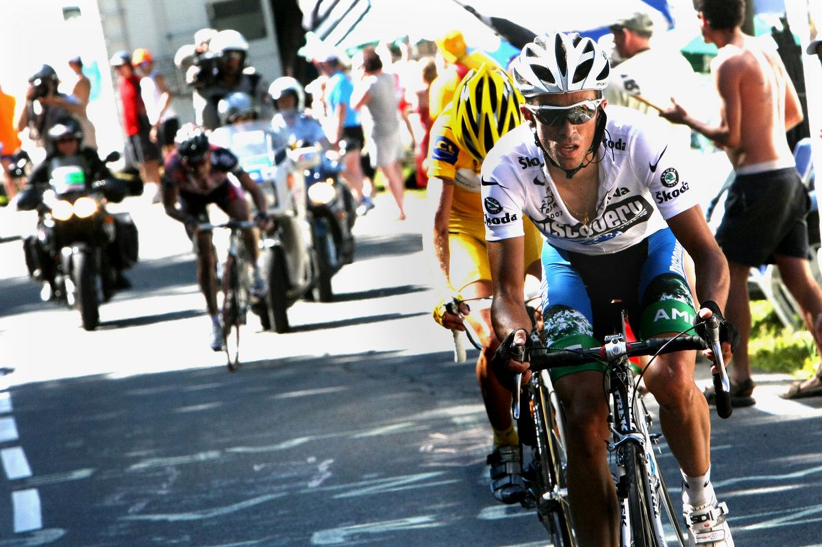 Alberto Contador and Michael Rasmussen ride away from Cadel Evans on the Col d'Aubisque