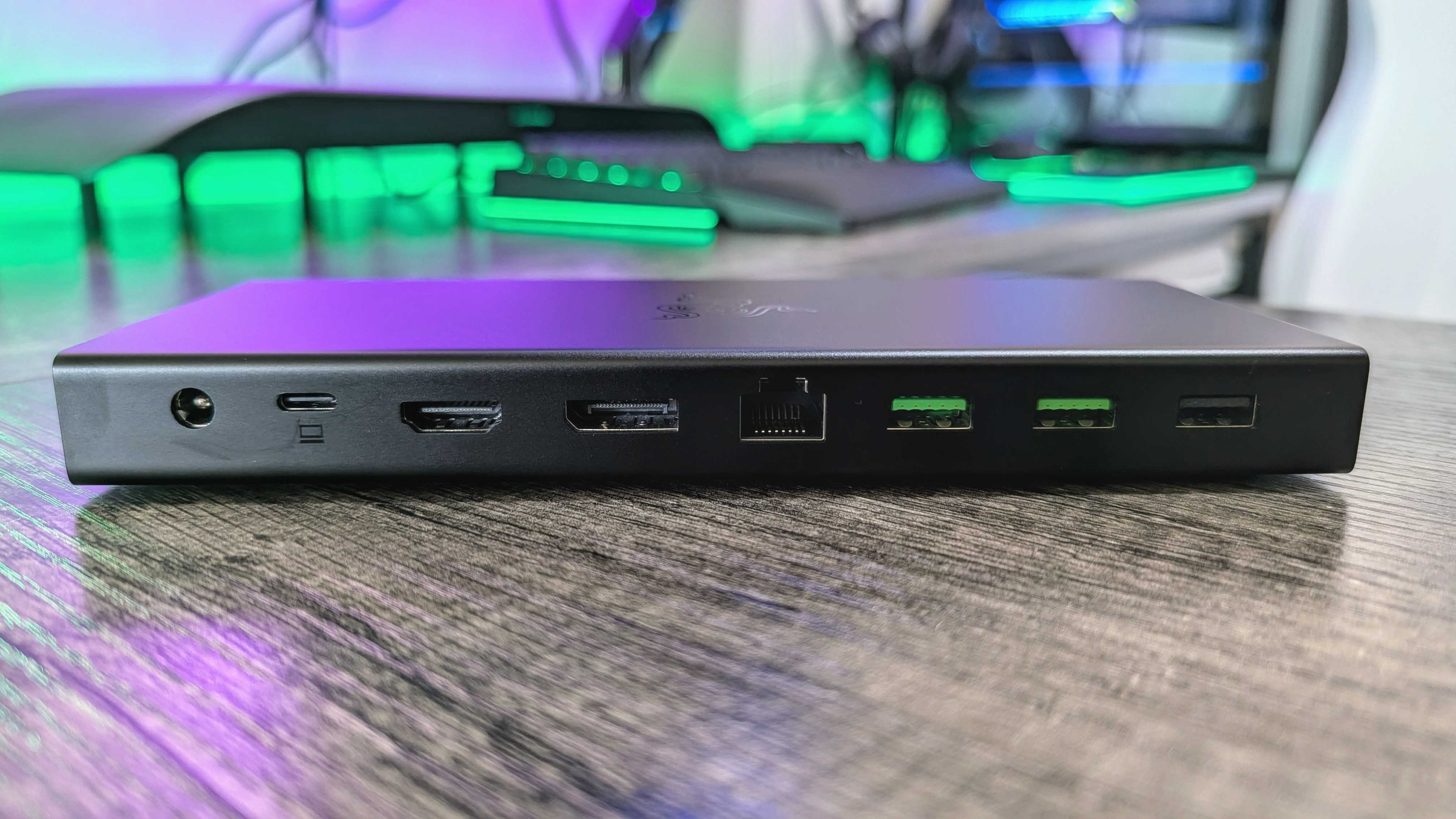 The Razer USB4 Dock as seen from the rear, showing the 180W DC power port, USB Type-C 4.0 input port with 100W Power Delivery, HDMI 2.1 port, Display Port 1.4 port, Gigabit Ethernet port, two USB Type-A 3.2 Gen 2 ports, and USB Type-A 2.0 port.