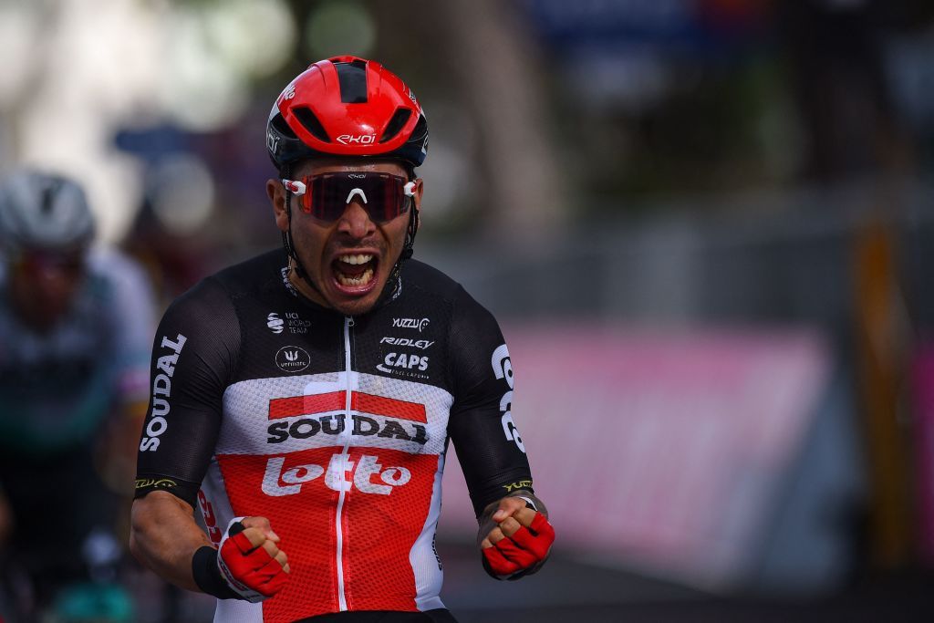 TOPSHOT Team LottoSoudal rider Australias Caleb Ewan celebrates on the finish line after winning the fifth stage of the Giro dItalia 2021 cycling race 177 km between Modena and Cattolica EmiliaRomagna on May 12 2021 Photo by Dario BELINGHERI AFP Photo by DARIO BELINGHERIAFP via Getty Images