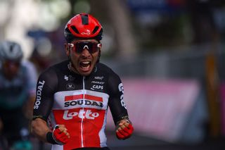 TOPSHOT Team LottoSoudal rider Australias Caleb Ewan celebrates on the finish line after winning the fifth stage of the Giro dItalia 2021 cycling race 177 km between Modena and Cattolica EmiliaRomagna on May 12 2021 Photo by Dario BELINGHERI AFP Photo by DARIO BELINGHERIAFP via Getty Images