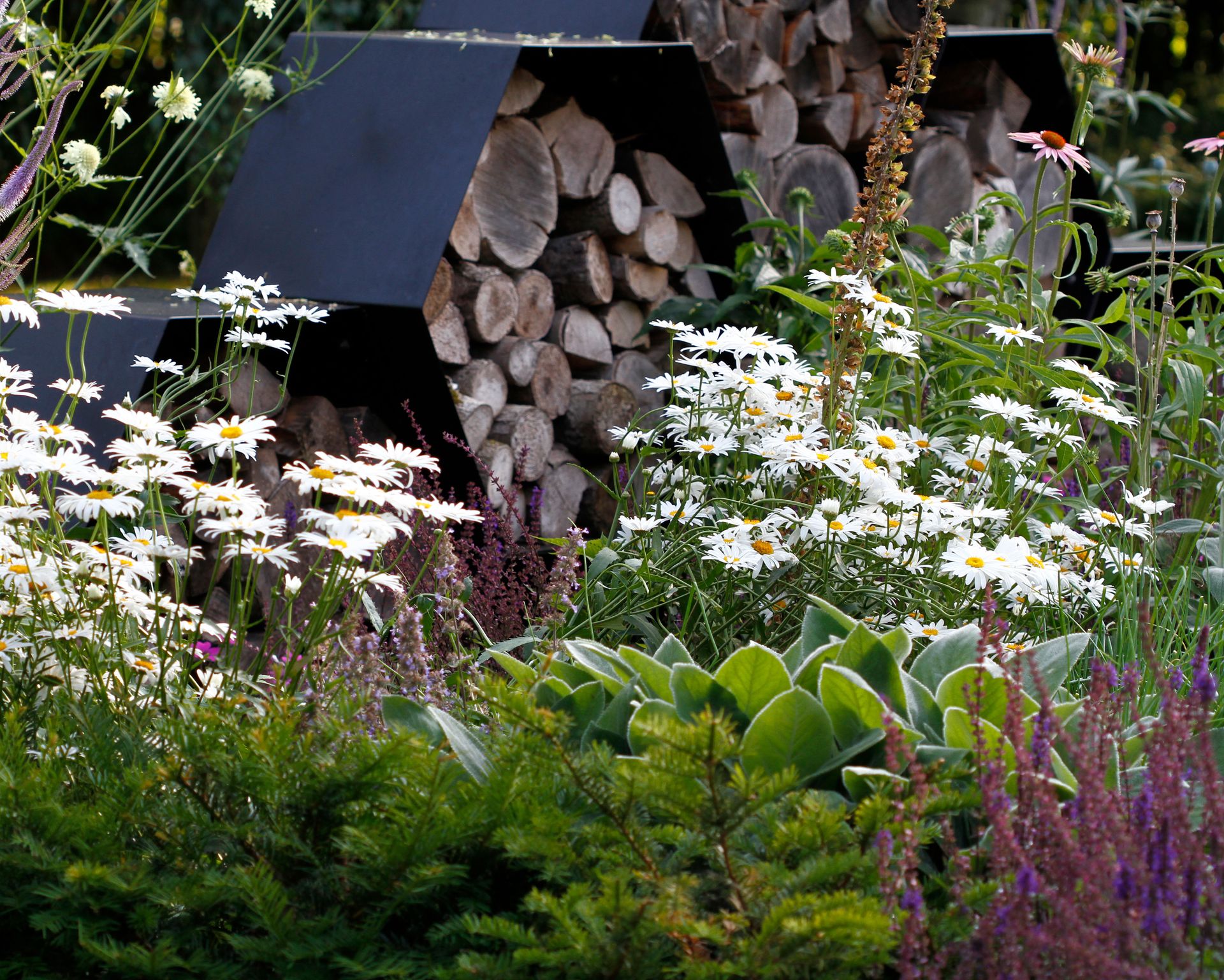 wildlife garden idea bee hotel in honeycomb shaped sculpture