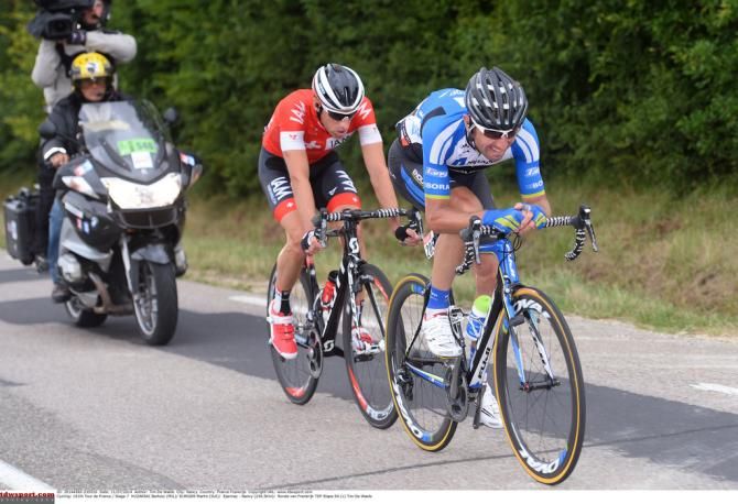 Bartosz Huzarski (NetApp-Endura) and Martin Elmiger (IAM Cycling)