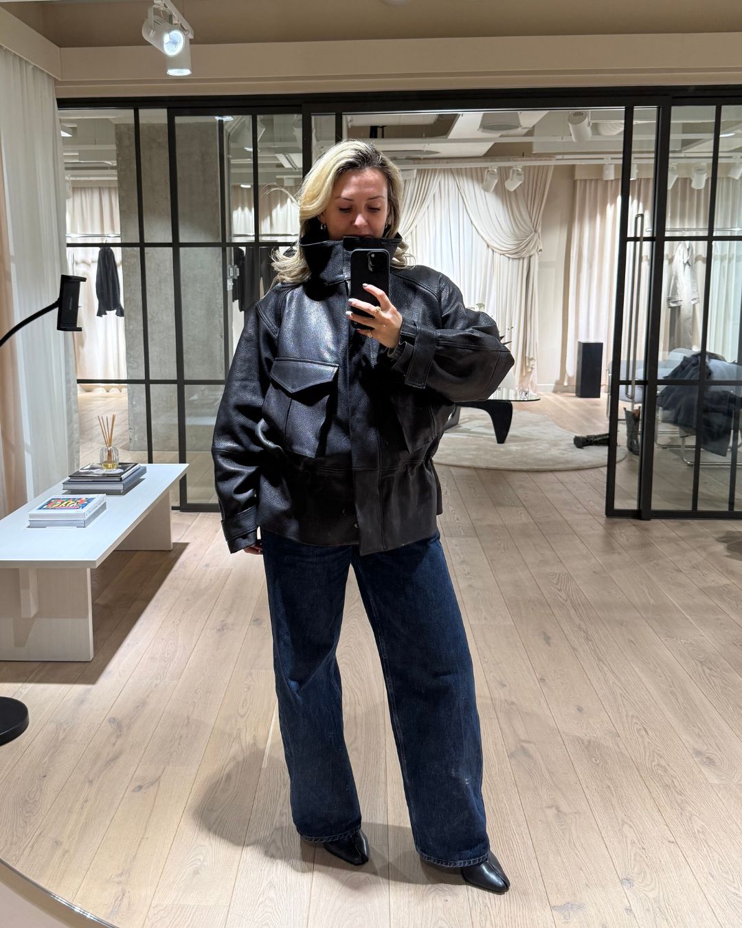 clementina jackson tries on a spring jacket from the new H&amp;amp;M studio collection