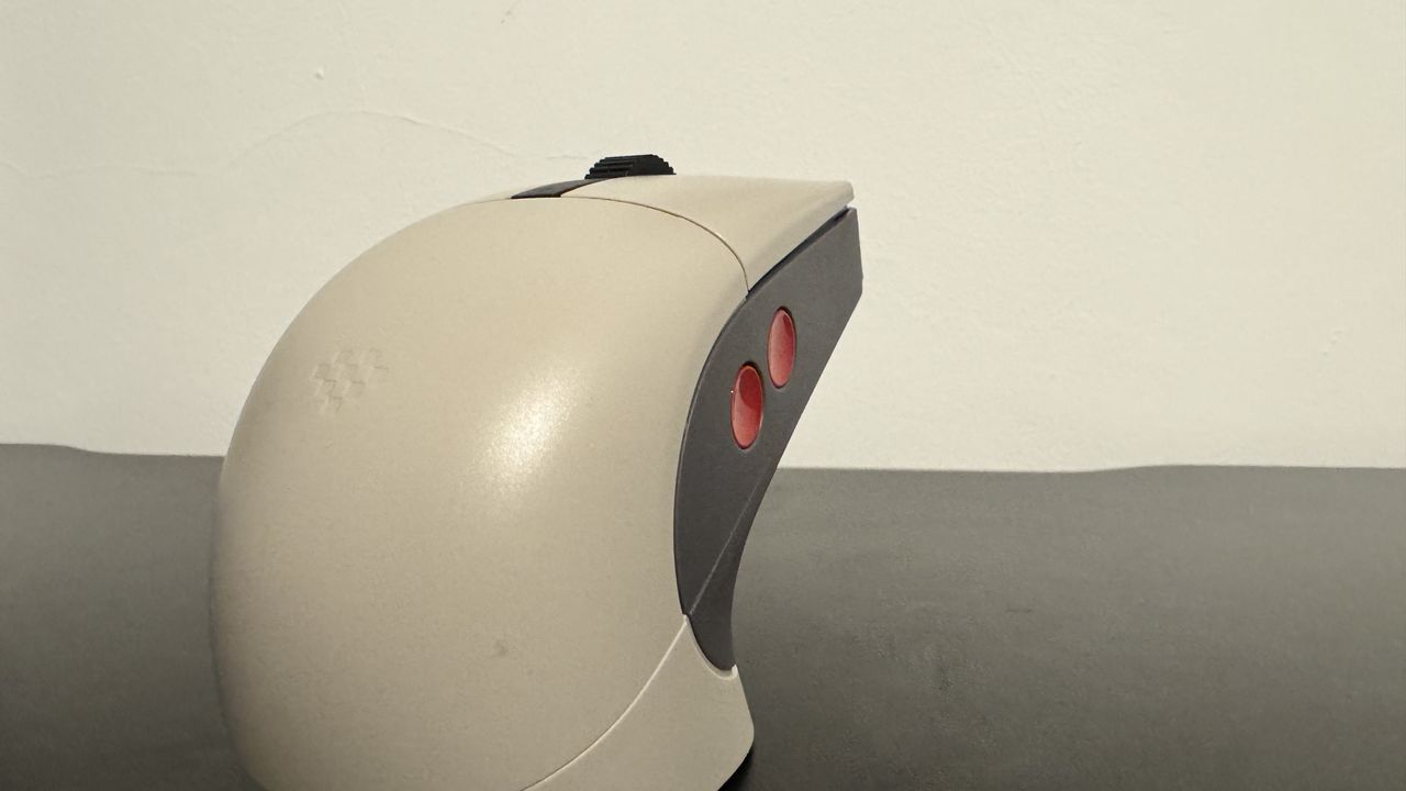 8BitDo Retro R8 gaming mouse from the back.