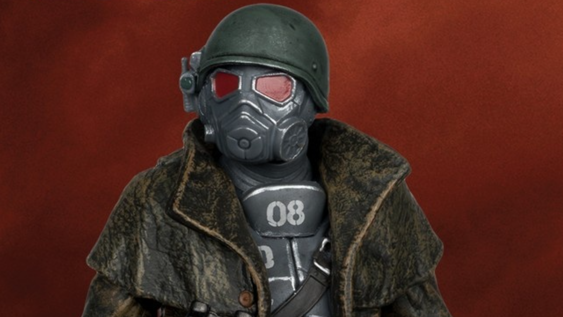 Shoulders up view of action figure sculpt of Fallout: New Vegas&#039; elite NCR Ranger in gas mask, riot armor, and gas mask on rust red background.