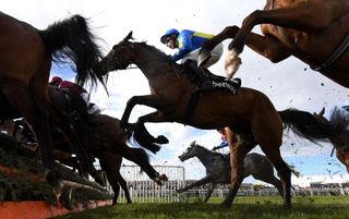 Grand National 2023 will feature jockeys including Harry Skelton, seen tackling the famous fences