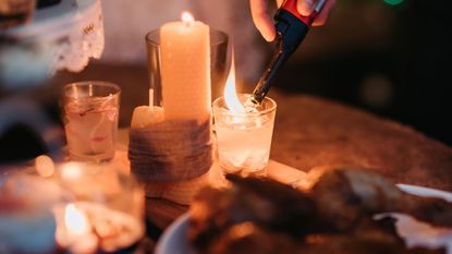 What to do with candles in a heatwave: a cluster of candles on a table