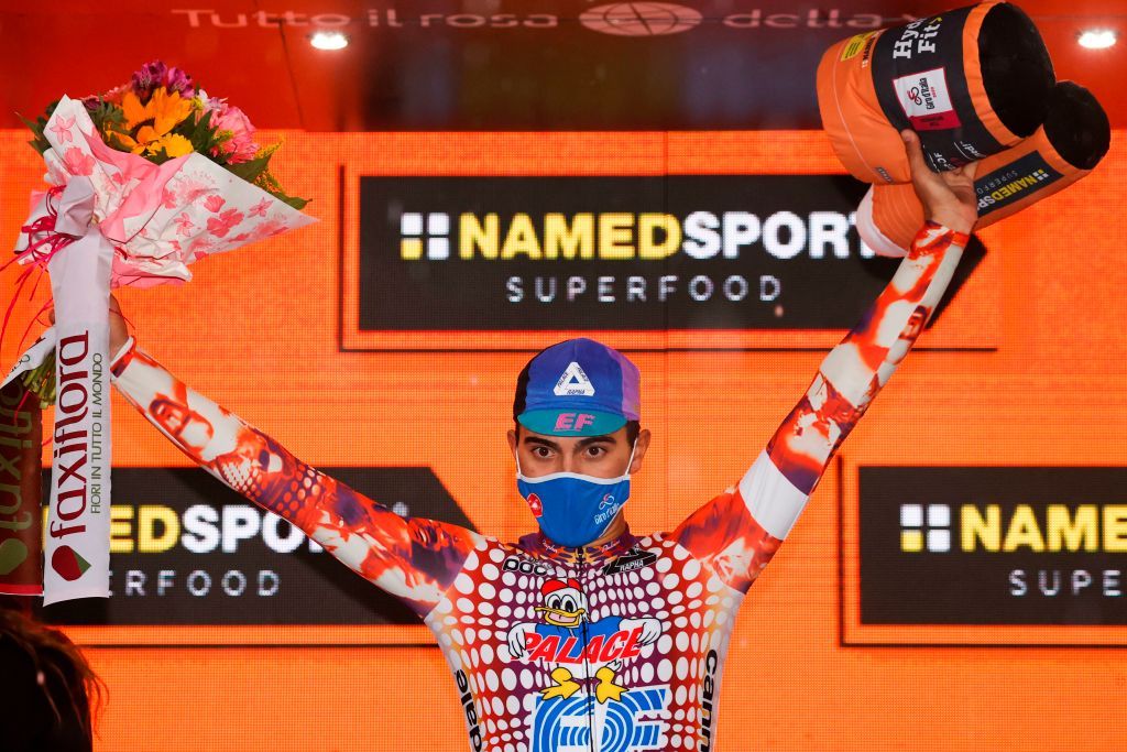 Team Education First rider Portugals Ruben Guerreiro celebrates on the podium after winning the 9th stage of the Giro dItalia 2020 cycling race a 208kilometer route between San Salvo and Roccaraso on October 11 2020 Photo by Luca Bettini AFP Photo by LUCA BETTINIAFP via Getty Images