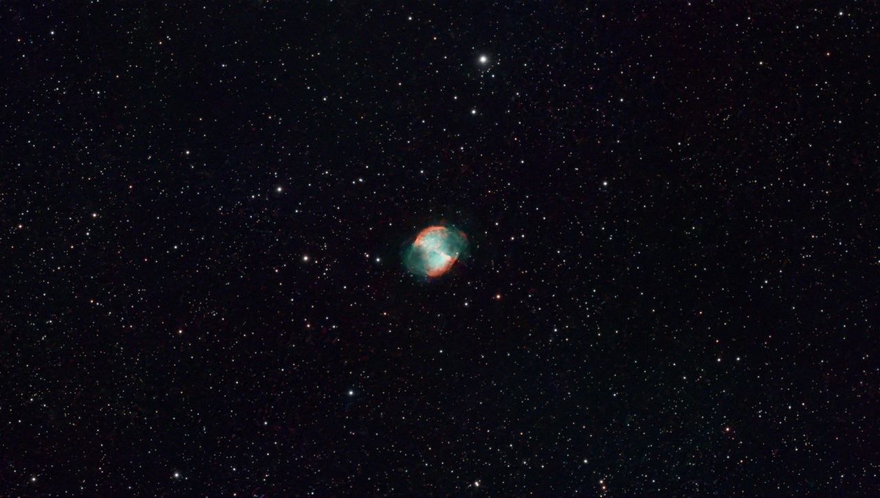 A photograph of the Dumbbell Nebula, taken with the Dwarf III smart telescope, processed in Pixinsight