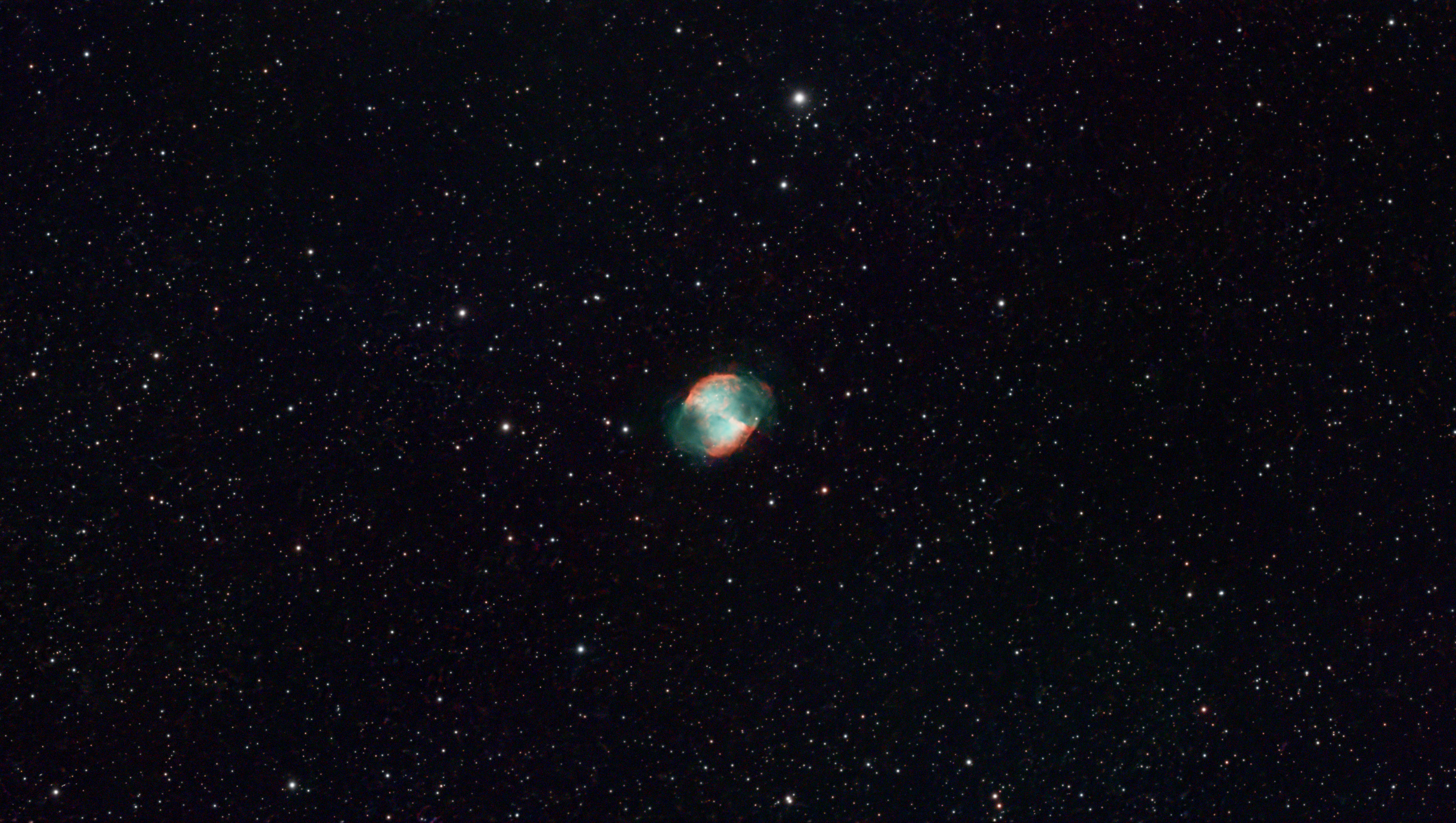 A photograph of the Dumbbell Nebula, taken with the Dwarf III smart telescope, processed in Pixinsight