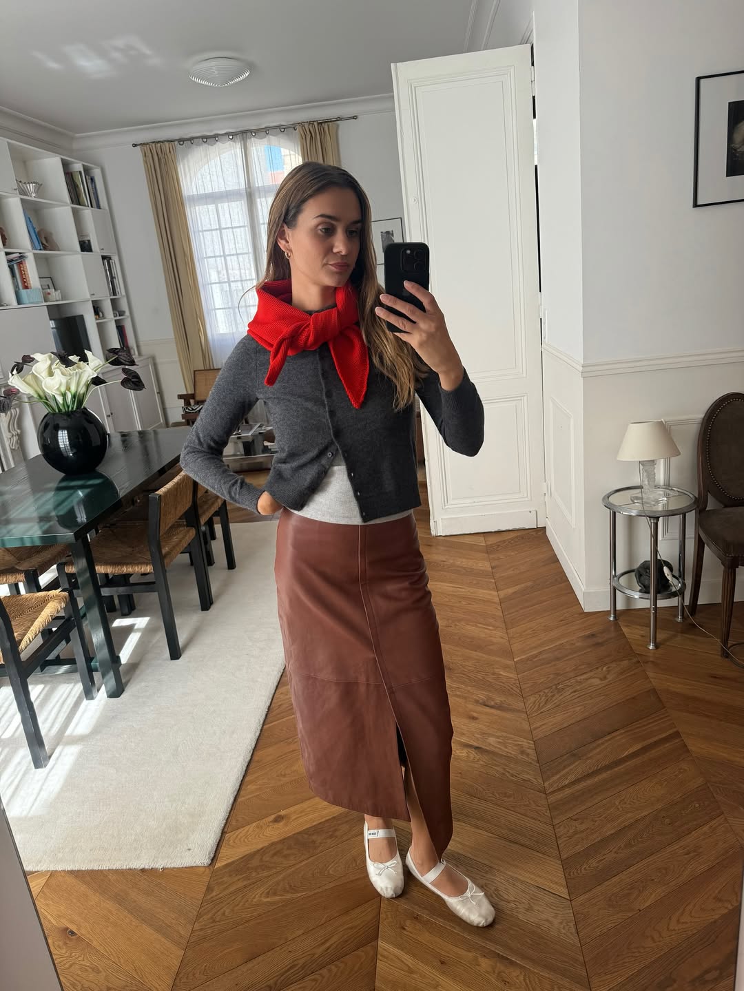 Anne-Laure Mais wearing a knit neck scarf.