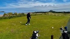 Fergus playing a shot at North Berwick