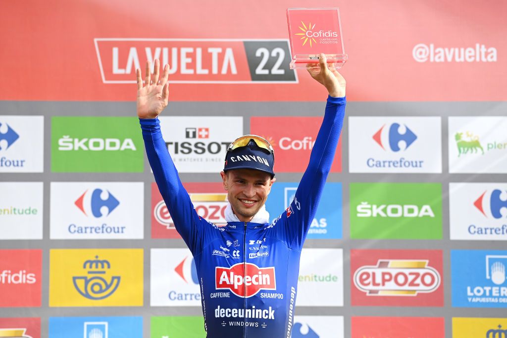 COLLU FANCUAYA SPAIN AUGUST 27 Jay Vine of Australia and Team AlpecinDeceuninck celebrates winning the stage on the podium ceremony after the 77th Tour of Spain 2022 Stage 8 a 1534km stage from Pola de Laviana to Collu Fancuaya 1084m LaVuelta22 WorldTour on August 27 2022 in Collu Fancuaya Spain Photo by Tim de WaeleGetty Images