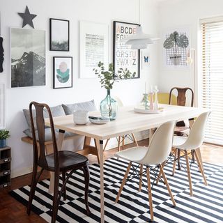 dining area with dining table and white table