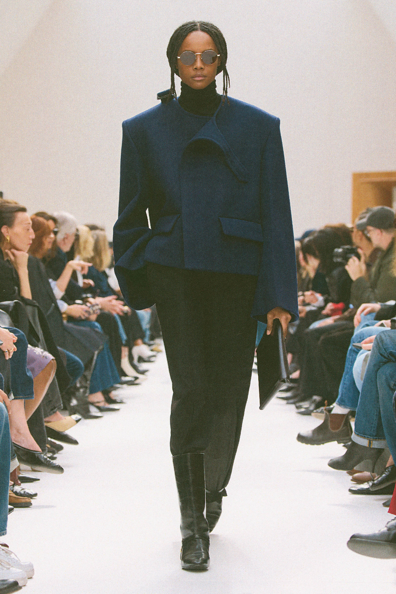 Model walking on a fall/winter 2026 runway.