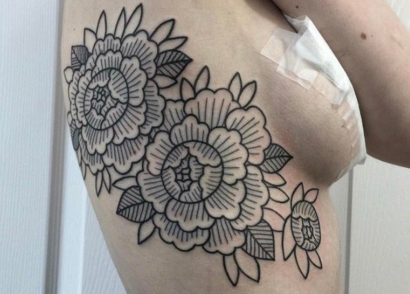 Geometric peonies tattoo