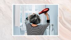 Image of woman blow-drying her short, curly grey hair, wearing a black and white striped top, on a white watercolour background