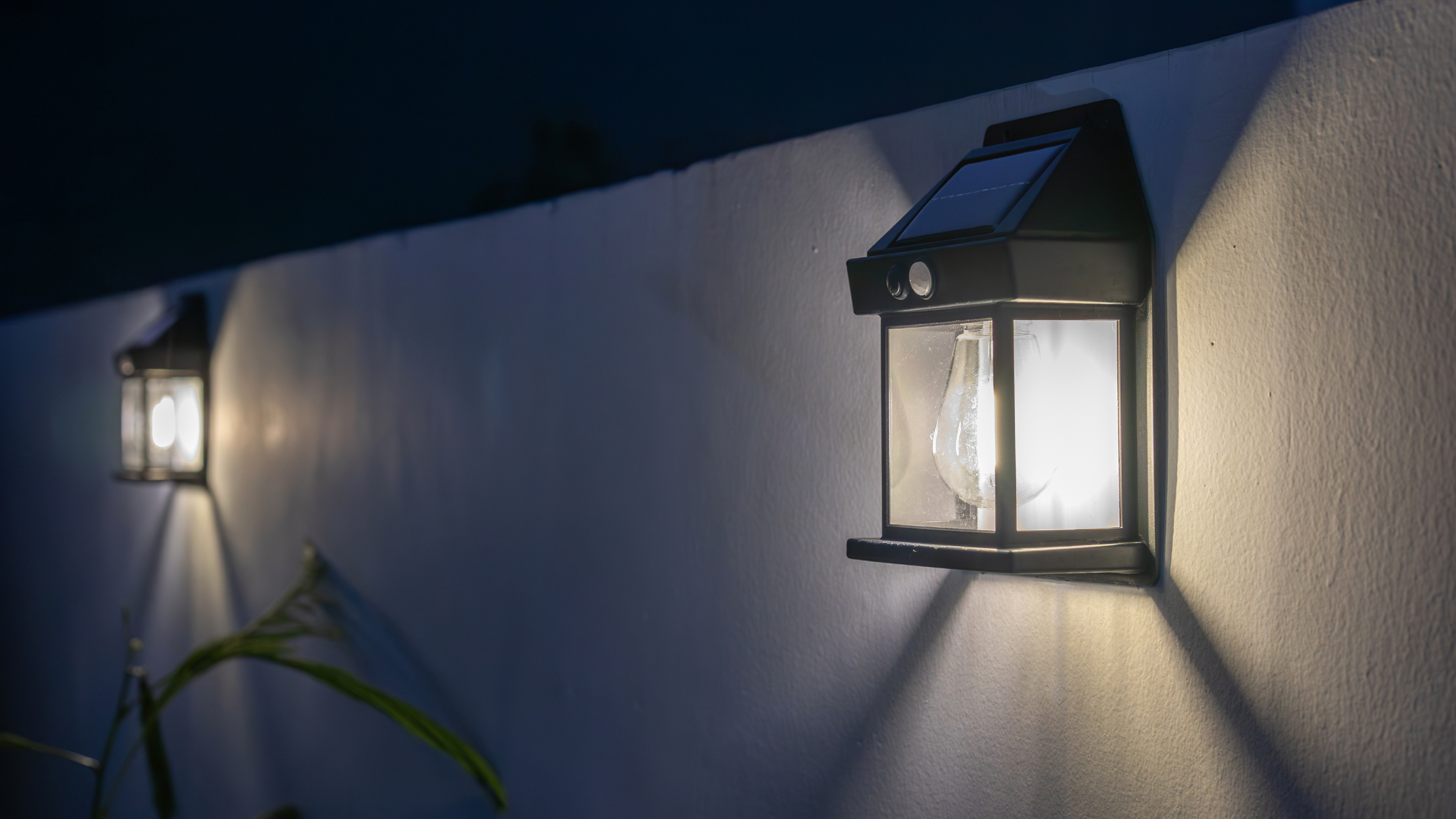 Decorative solar powered energy light installed on the wall.