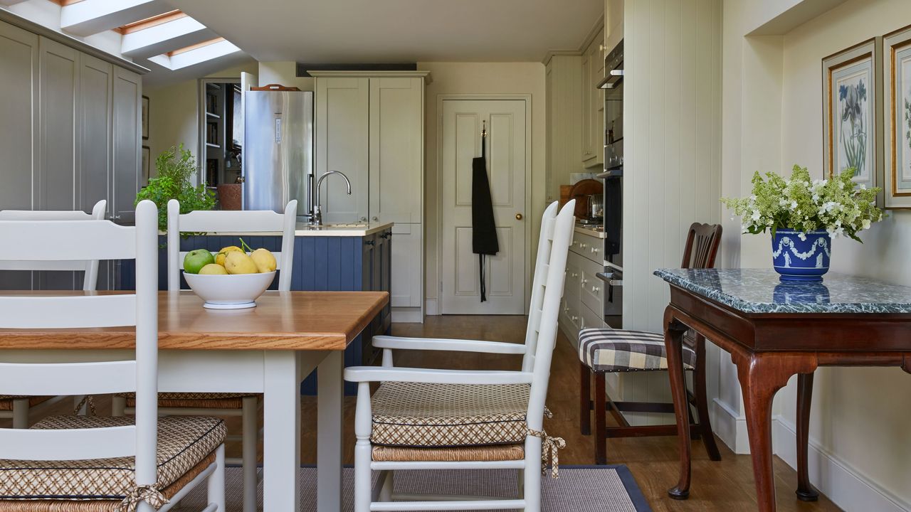 cream kitchen with dark grey blue island