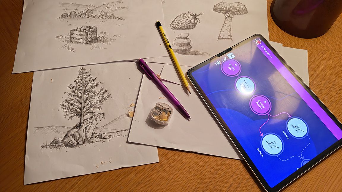Simply Draw iPad app; pencils, paper, and an iPad