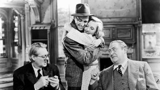 Lionel Barrymore, Jimmy Stewart, Jean Arthur and Edward Arnold in You Can't Take It With You