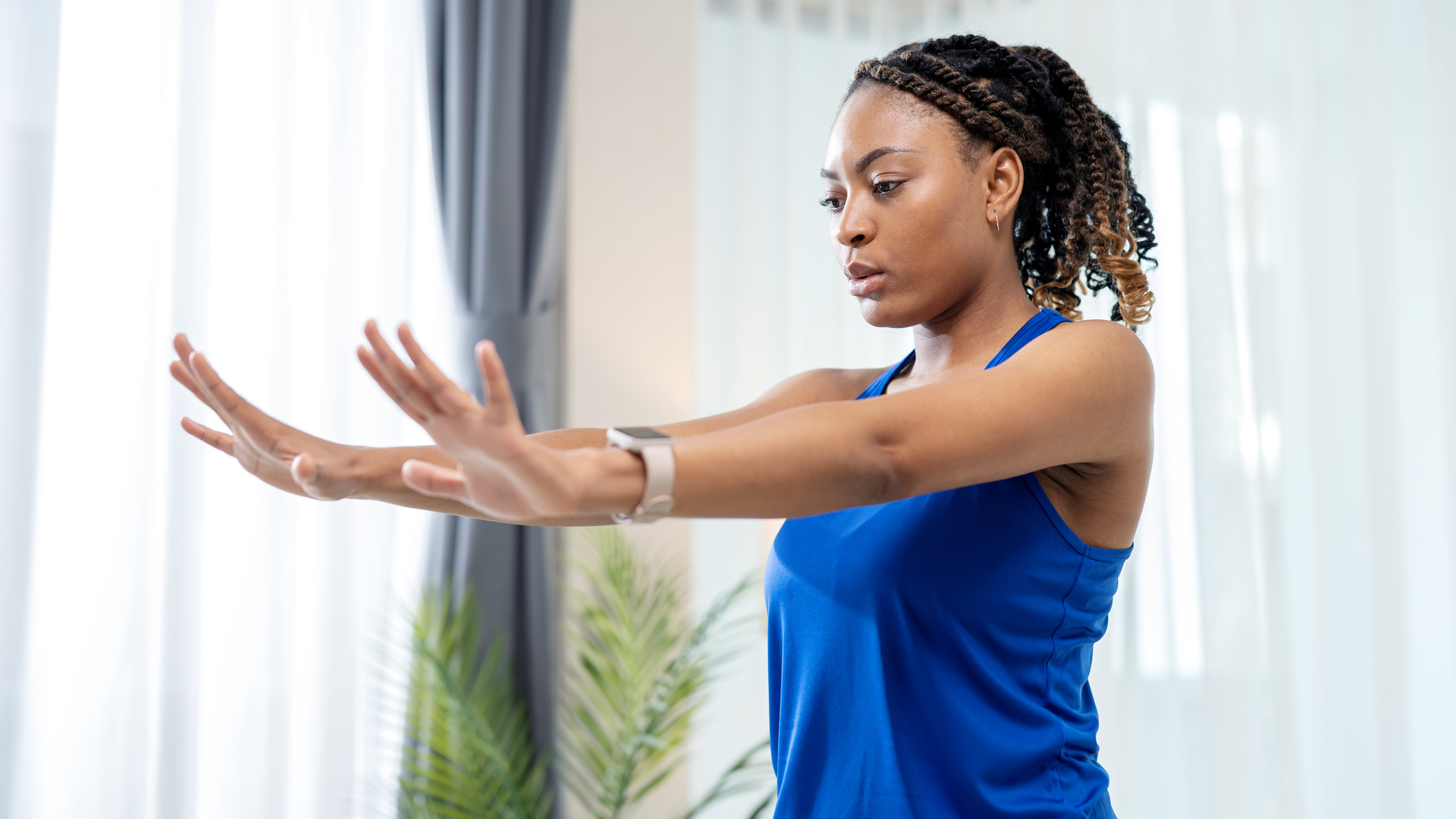 Woman holding her hands out in front of her