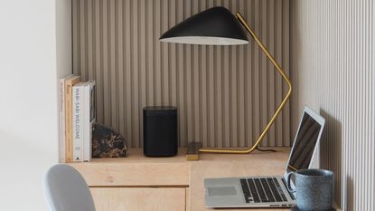 a sonos speaker on a desk