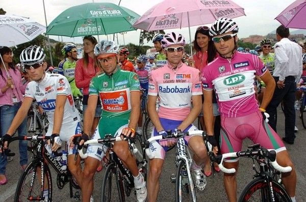 The jersey holders at the start of stage 20. (L-R) Kevin Seeldraeyers, best young rider; Stefano Garzelli, mountains classification leader; Denis Menchov, overall leader; and Danilo Di Luca, points leader.