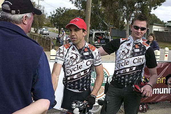 Charles Howlett is congratulated by Tour Director John Craven (left) and team manager Stuey Sanders.