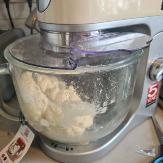 Kneading bread dough in the Kenwood kMix mixer in colour cream