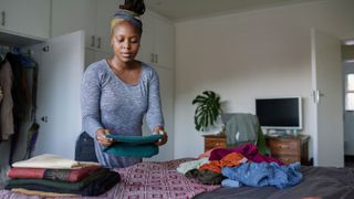 woman organizing clothing