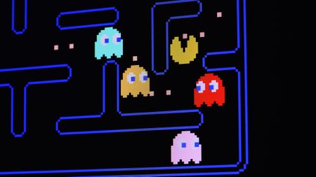 A photo of the vintage Pac-Man videogame. 