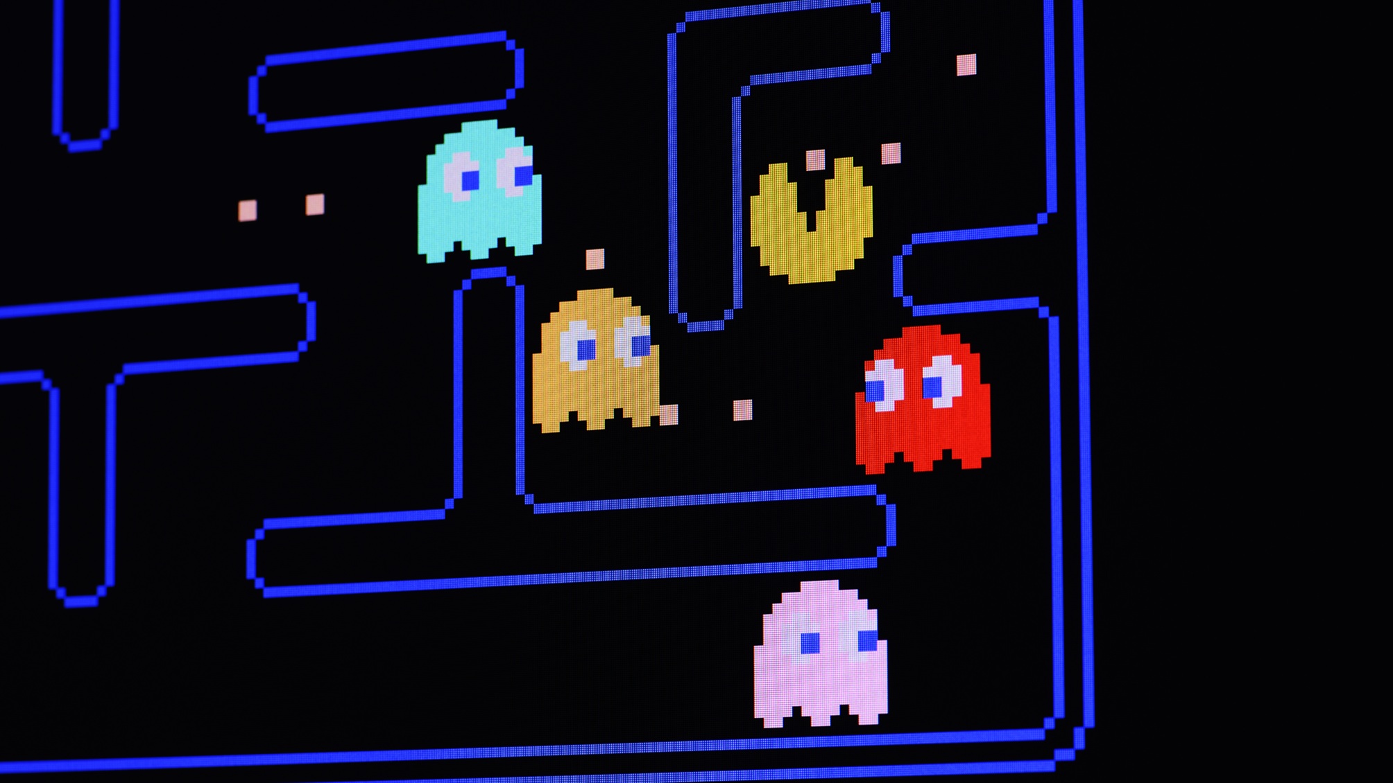 A photo of the vintage Pac-Man videogame. 