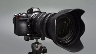 Nikon Z7 II on a tripod with a lens attached