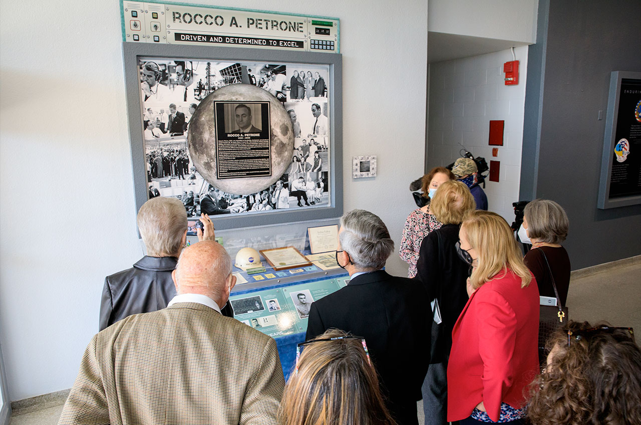 A display of memorabilia dedicated to Apollo-era launch director Rocco Petrone is viewed by guests inside the launch control center that now bares his name, on Tuesday, Feb. 22, 2022 at NASA's Kennedy Space Center in Florida.