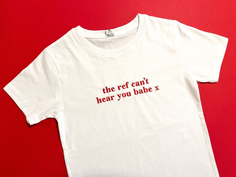 The Ref Can't Hear You Babe Embroidered T-Shirt: Football Slogan