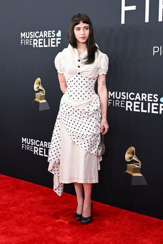 Clairo wears Miss Claire Sullivan on the 2025 Grammys red carpet