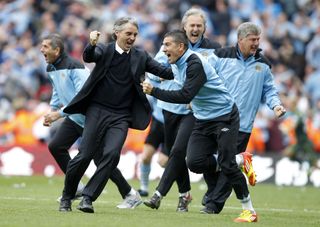 Joy could not be contained on the touchline after Aguero's winner
