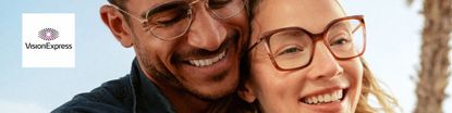 vision express logo top left with a couple hugging with glasses on in the sun