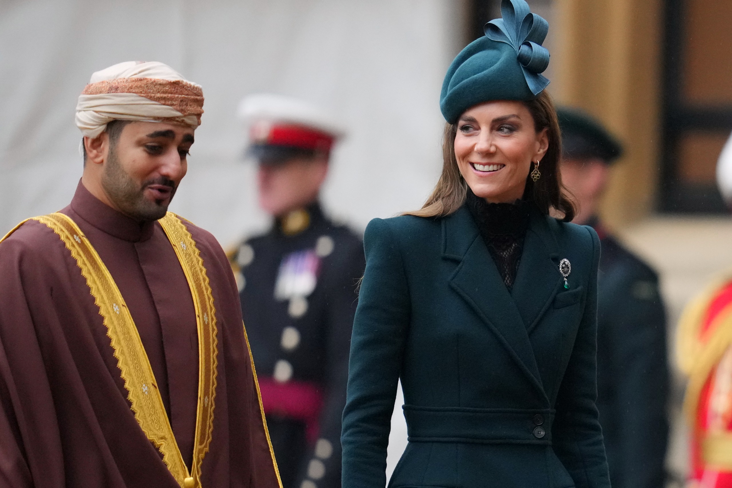 Crown prince of Oman, Sayyid Theyazin bin Haitham Al Said and Princess Kate smiling and walking next to each other