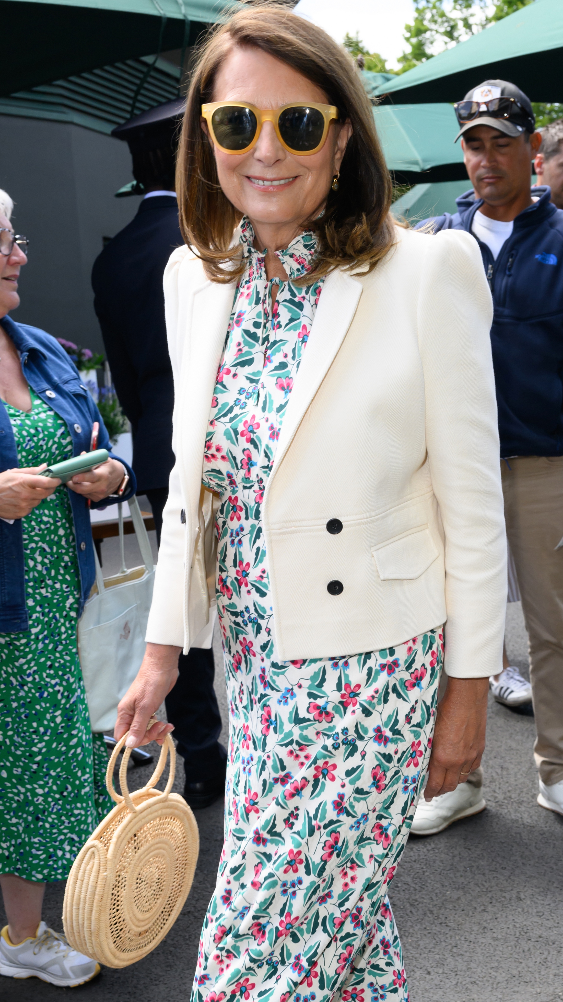 Carole Middleton attends day four of the Wimbledon Tennis Championships wearing a floral dress and white jacket on July 04, 2024