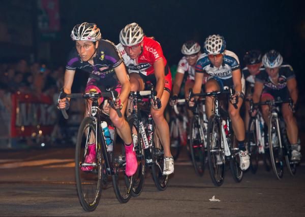 Kristen Lasasso (Mellow Mushroom-Rose Bandit Racing) leads the pack over the line with one lap to go