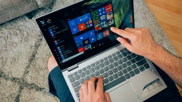 A Lenovo laptop being used on someone&#039;s lap