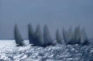 1957: A fleet of boats take part in a regatta off the coast of California. Colour Photography book