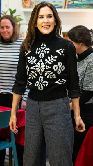 Queen Mary of Denmark attends the WeShelter Food Club Event at NABO Center Amager on December 17, 2024