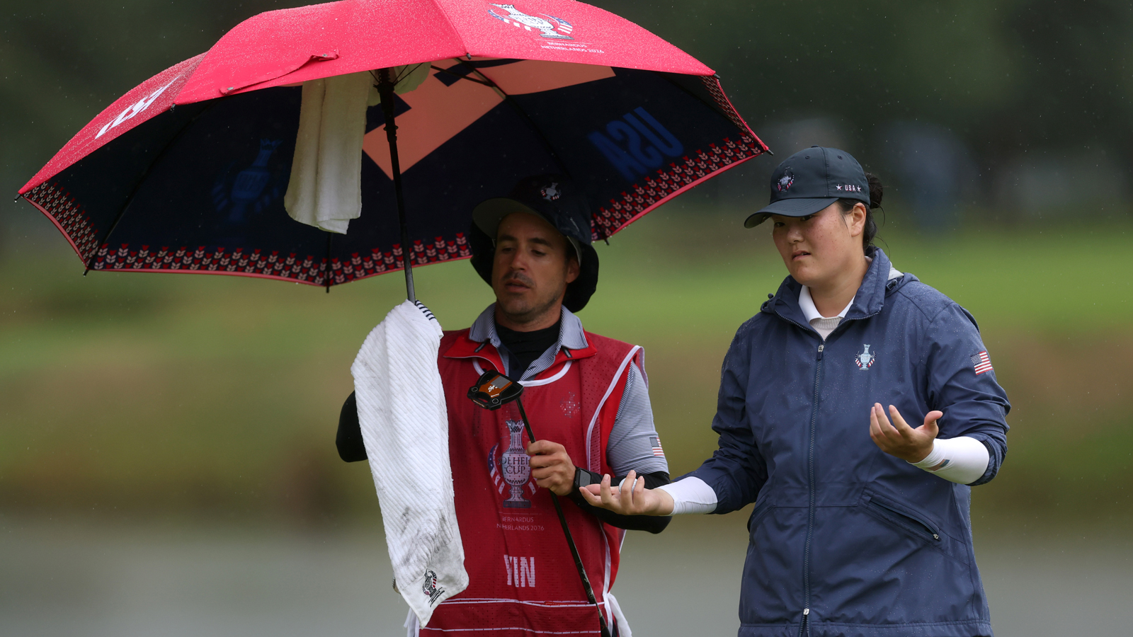 Angel Yin and her caddie chat