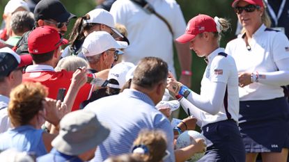 Nelly Korda of Team United States signs autographs for fans prior to the Solheim Cup at Robert Trent Jones Golf Club on September 12, 2024 in Gainesville, Virginia.