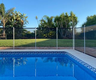 backyard pool with fence