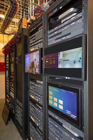 A close up of a rack controlling the UNC school of journalism using Extron AVoIP solutions.