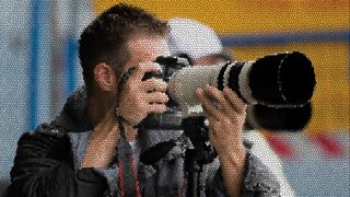 Mosaic effect of photographer using DSLR with white telephoto lens